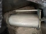a close up of a metal object with a handle