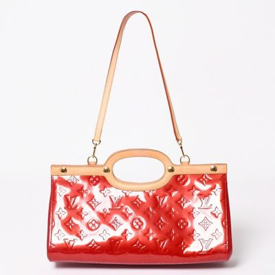 louis vuitton red monogramet leather and leather handbag