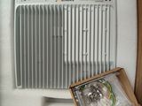a box with an air conditioner inside of it
