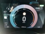the dashboard of a car with a digital display showing the speed of the car