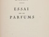 the front cover of an old book with a black and white image of the title