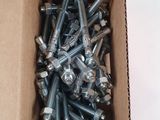 a box full of screws and nuts in it