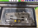 a tool box with a wren set inside of it