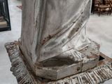 an image of a statue of a woman on a pedestal in a room
