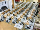 a lot of stuffed animals on display in a store