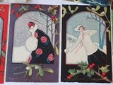 several cards with different designs of women dressed in black and white
