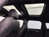 a view of the sunroof from inside of a car