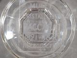 a clear glass bowl with a stop sign on it