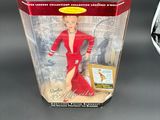 the action figure is in a plastic box with a picture on it