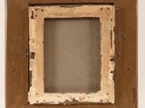 an old wooden picture frame with a small window in it