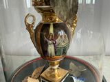 a vase with a bunch of flowers inside of it