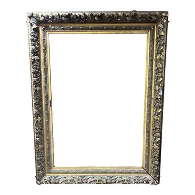 an old silver picture frame with a white background