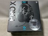 a box with a pair of headphones sitting on top of it