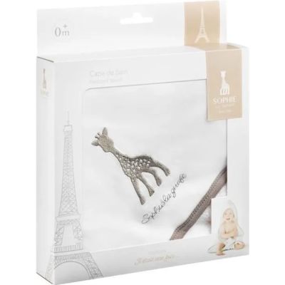 La petite girafe est présentée dans un coffret cadeau orné d'un ruban