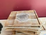 several pieces of wood are stacked on top of each other on a table