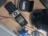 a cell phone and a remote on a table