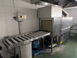 an image of a commercial kitchen with a conveyor belt