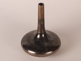 a small metal object that is sitting on a table