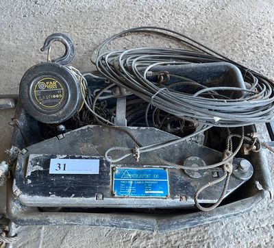 an old machine that is sitting on the ground