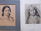 an old picture of a woman and a young girl in a picture frame