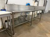 two stainless steel sinks in a large room
