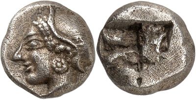 a silver coin with an image of a man and a woman on it