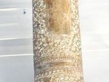 an image of a glass container with a metal handle