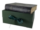 two books stacked on top of each other with a bow