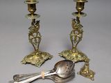 pair of antique brass candlesticks with spoon and spoon rest