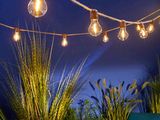 many light bulbs that are hanging from a string