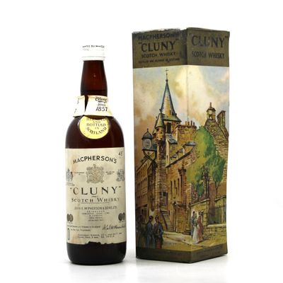 une photo d'une bouteille de whisky Cluny à côté d'une boîte