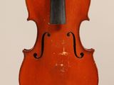 a close up of a violin with a bow on a white background
