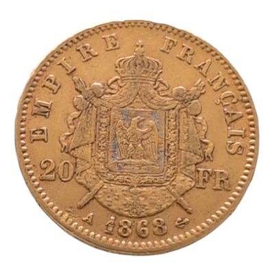 Gros plan sur une pièce de monnaie portant des armoiries