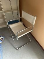 Chaise en tube chromé et cuir blanc. (photo 3)
