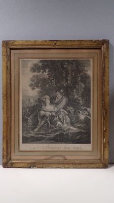 deux reproductions encadrées représentant une femme et un chien dans un décor boisé