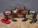 a lot of toy cars that are sitting on a table