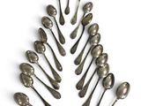 a lot of spoons and spoon spoons arranged in the shape of a tree