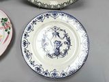 three plates that are sitting on a table