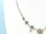 a close up of a necklace on a mannequin mannequin mannequin mannequin mannequin mannequin mannequin mannequin