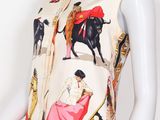 an image of a mannequin wearing a top with a horse and rider print