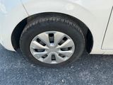 a close up of a car ' s tire on the road