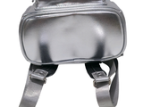 a silver bag that is attached to the back of a backpack