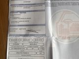 une photo d'un ticket de caisse sur laquelle figure l'image d'une maison