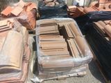 many different types of roofing materials on the ground