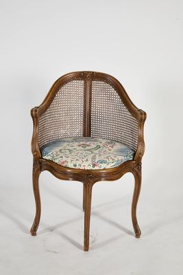 an image of a chair with a cushion on it