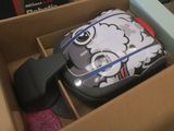 une boîte contenant une souris et un tapis de souris