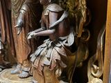 a statue of a man and a woman in a boat