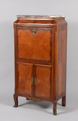 Secrétaire en placage de bois de rose dans des encadrements …