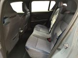 the back seats of a car are empty with no one in it