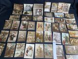 a lot of old postcards sitting on a table